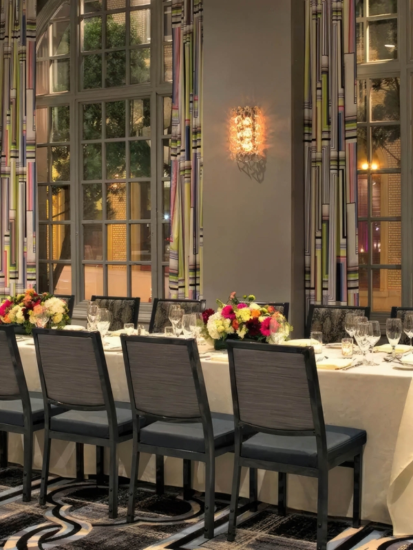 long table set up for service at the marker