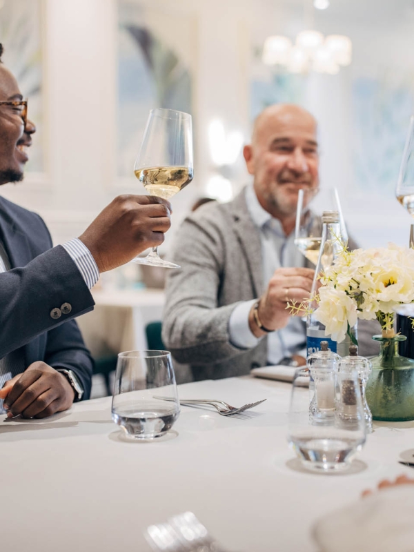 people toasting to a special occasion at the marker