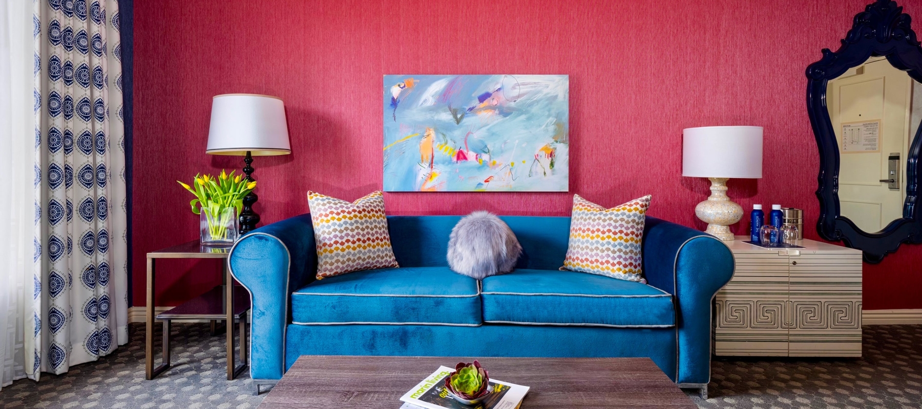 A blue sofa in a room at The Marker