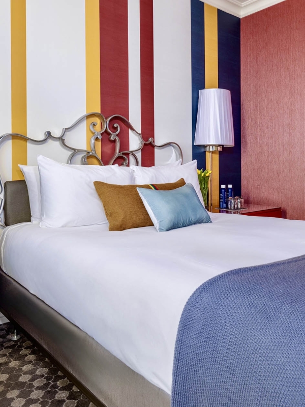 Side view of a bed in a room at The Marker